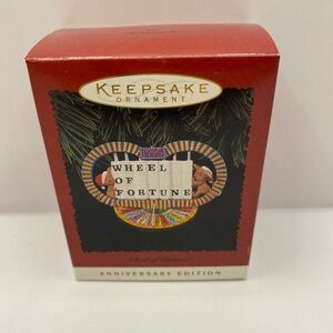 1995 hallmark wheel of fortune Christmas ornament.